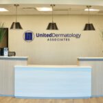 United Dermatology medical office interior reception desk construction project by Ren Pro General Contracting in Texas
